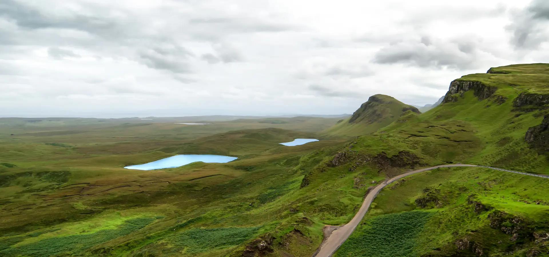 Green grass and lagoons landscape