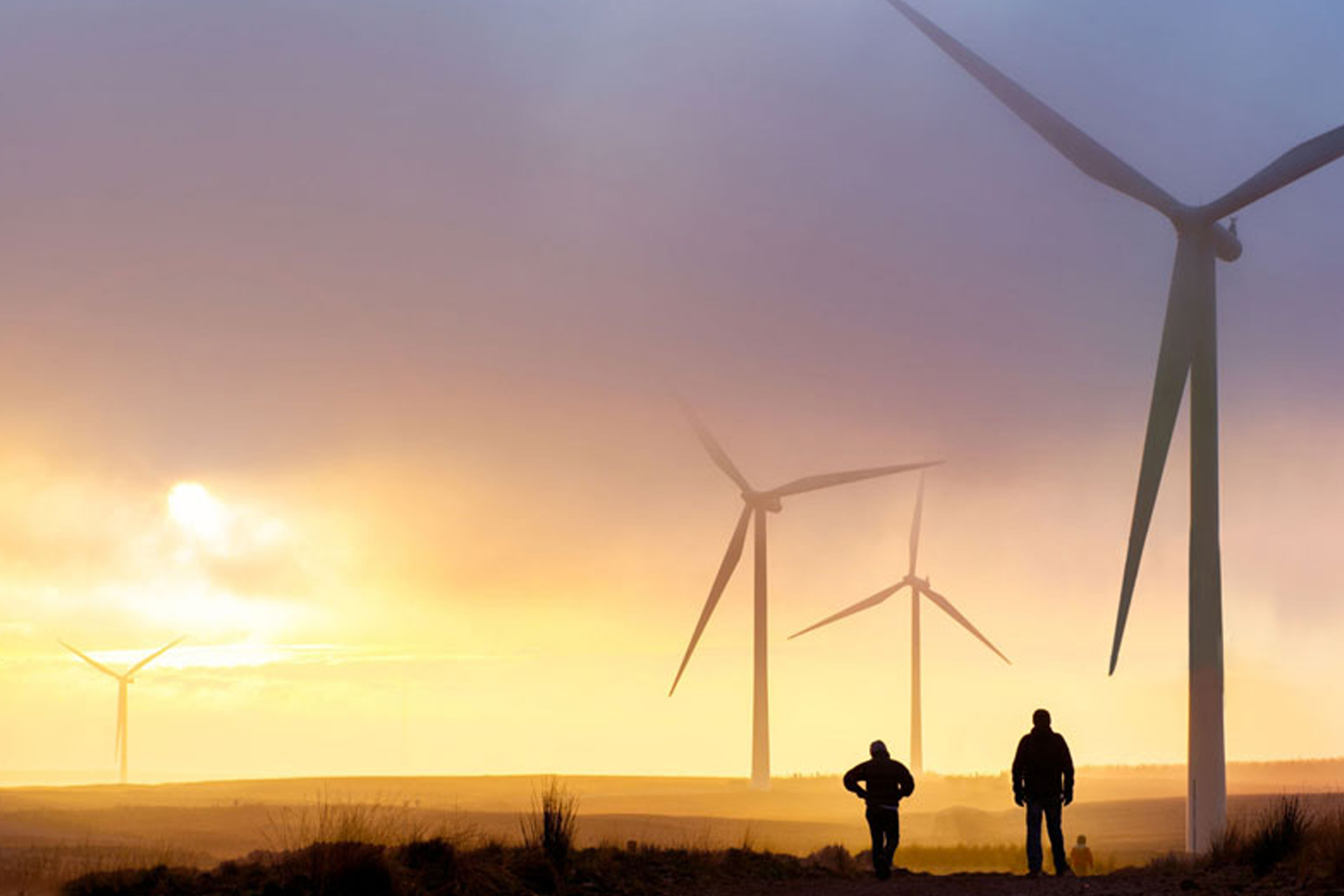 Wind turbines at sunset